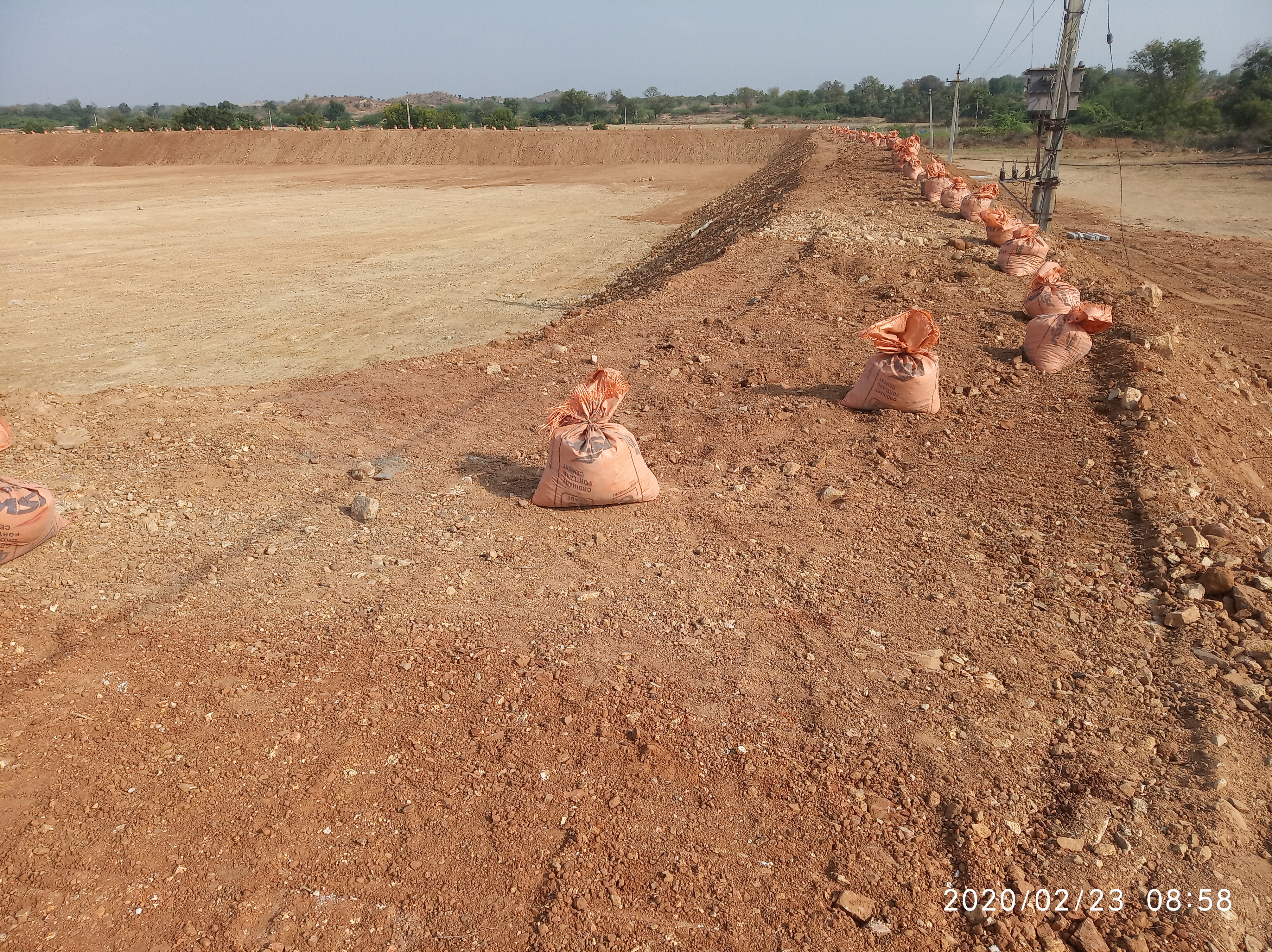 Fish Farming activity - Sand bags preparation for Tank
